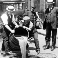 Photo of prohibitionists pouring out alcohol